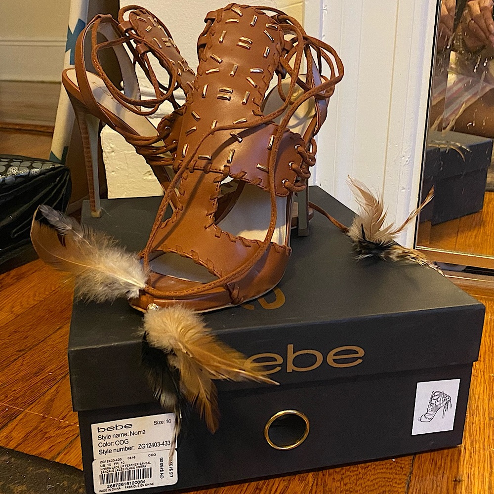 Brown feather tip heels